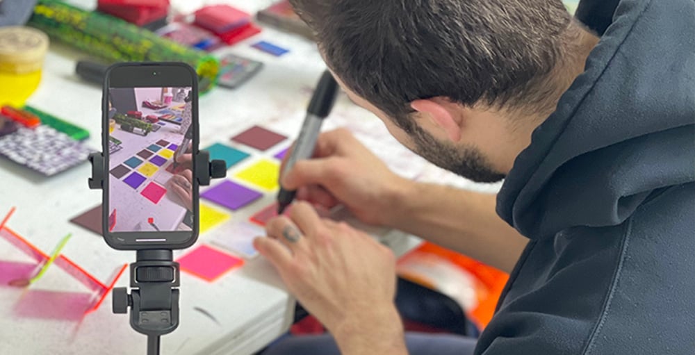 Student working on graduate portfolio preparation artwork in a New York studio class