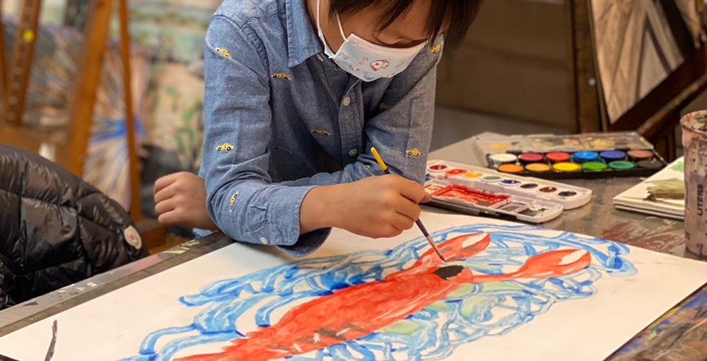 Hands-on art project activity for kids in a small group class setting in New York