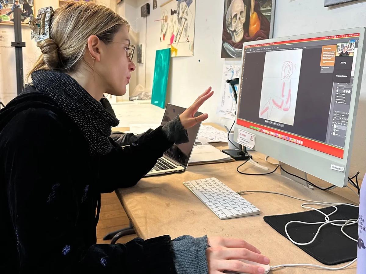 Student working on digital art portfolio during live online class from New York Art Studio