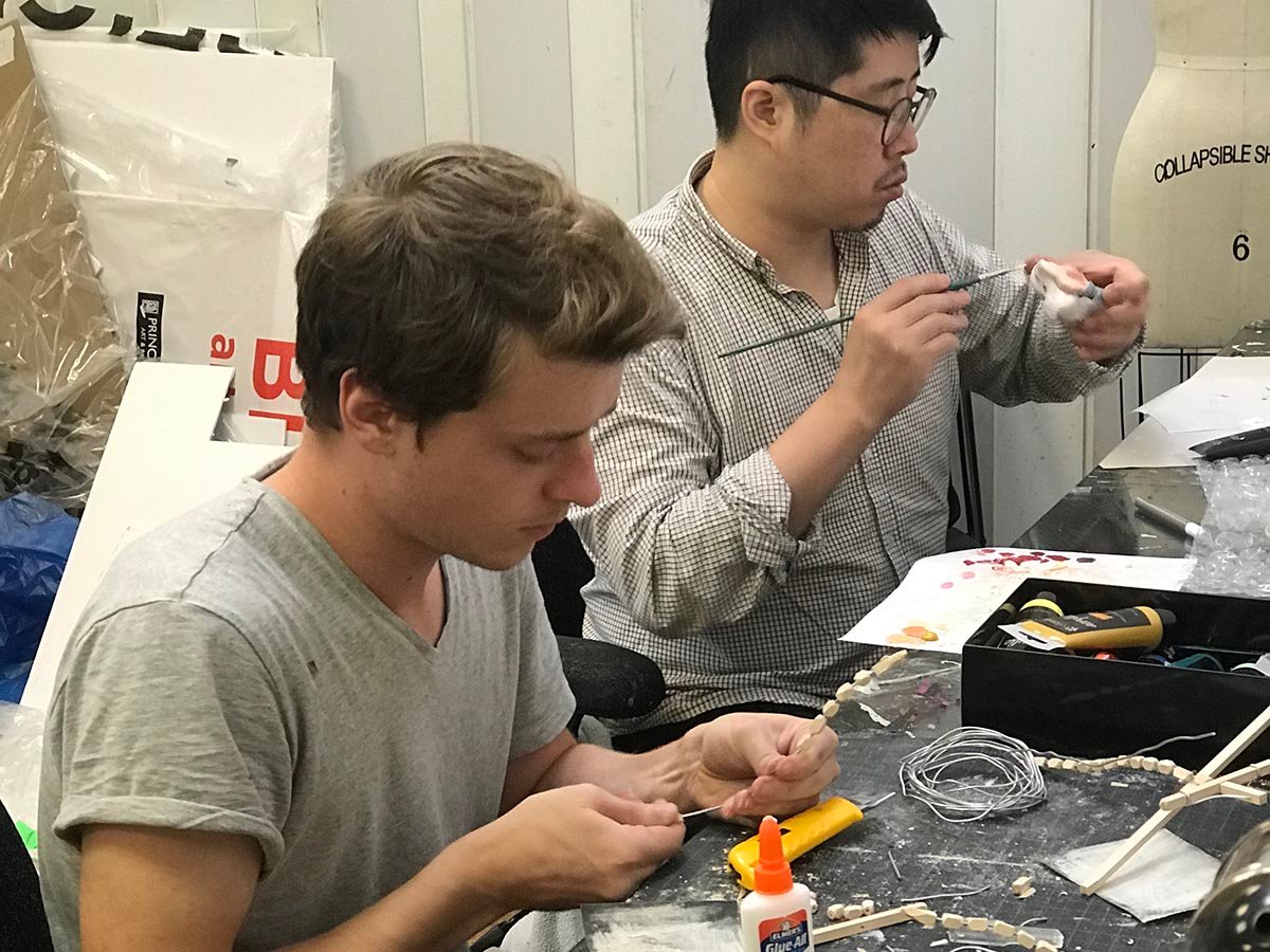 Students working on art projects during private portfolio lesson at New York Art Studio