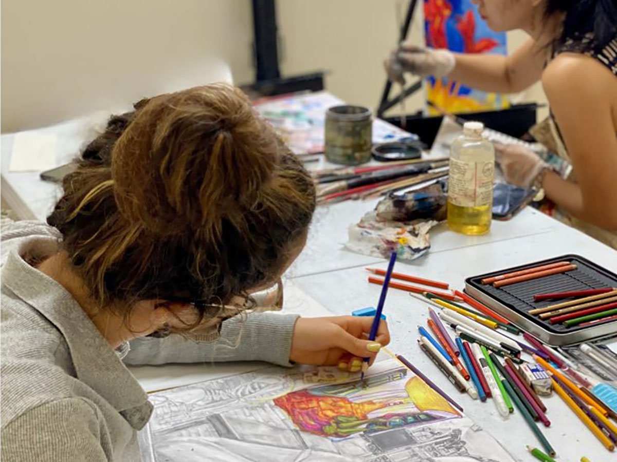 Students working on portfolio drawings during summer art program in NYC at New York Art Studio