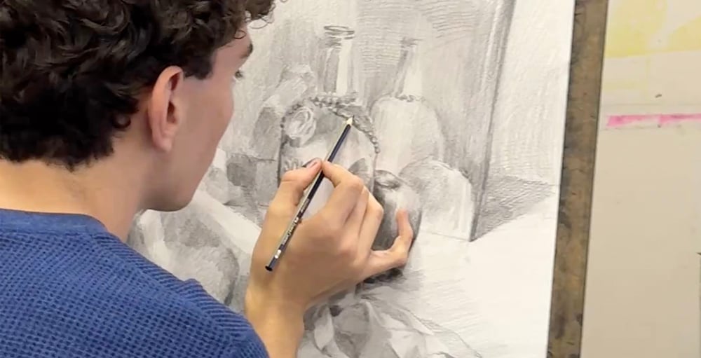 Student practicing drawing as part of summer portfolio preparation program in NYC